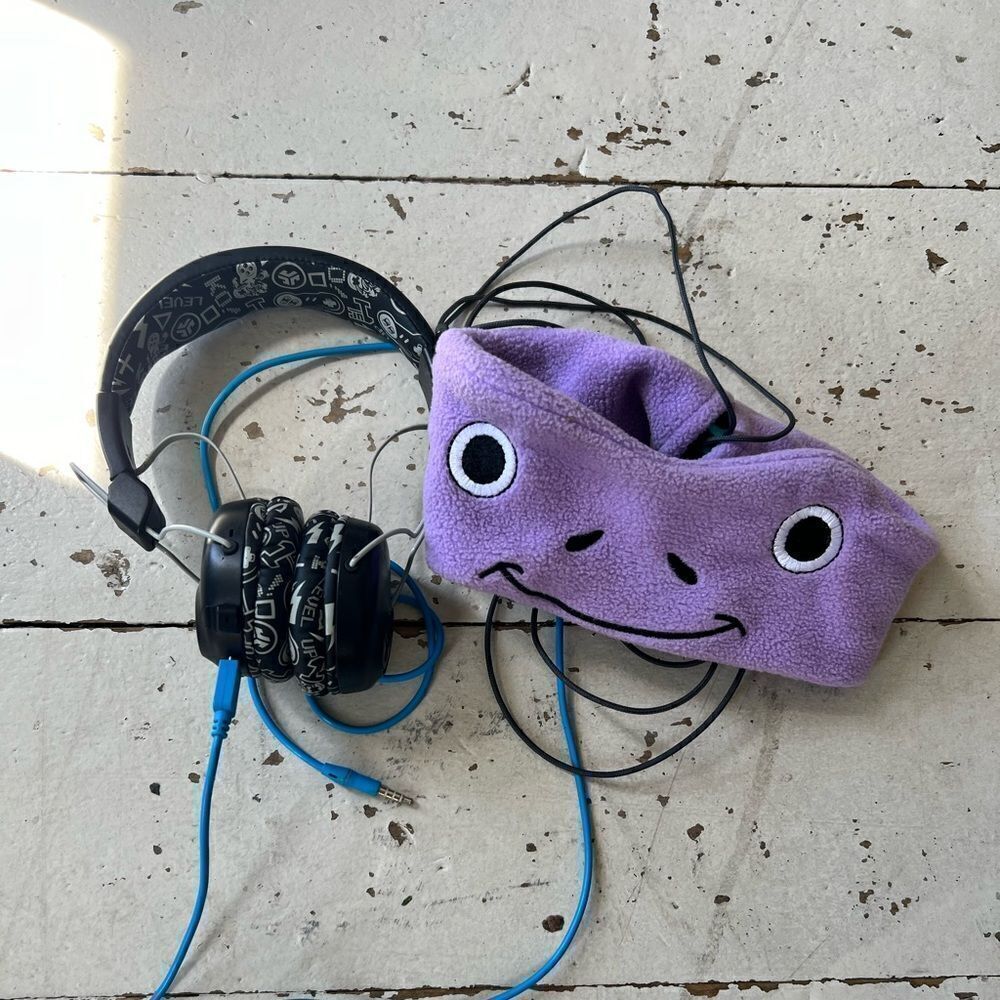 Two sets of kids headphones with volume reduction.